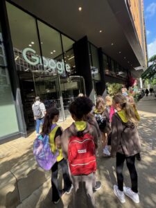 Brownies with their rucksacks outside of google HQ