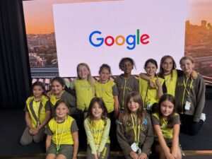 Brownies sit infront of the google sign
